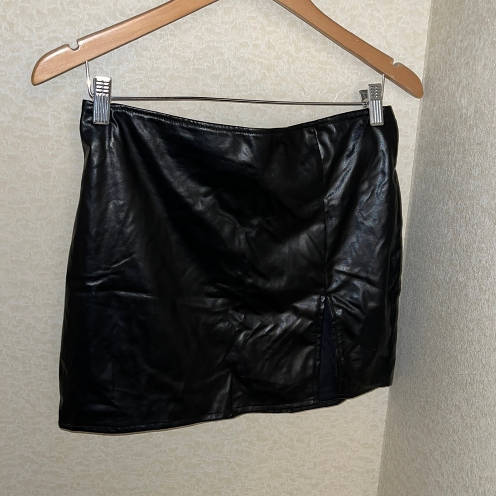 Black leather mini skirt with leg split
